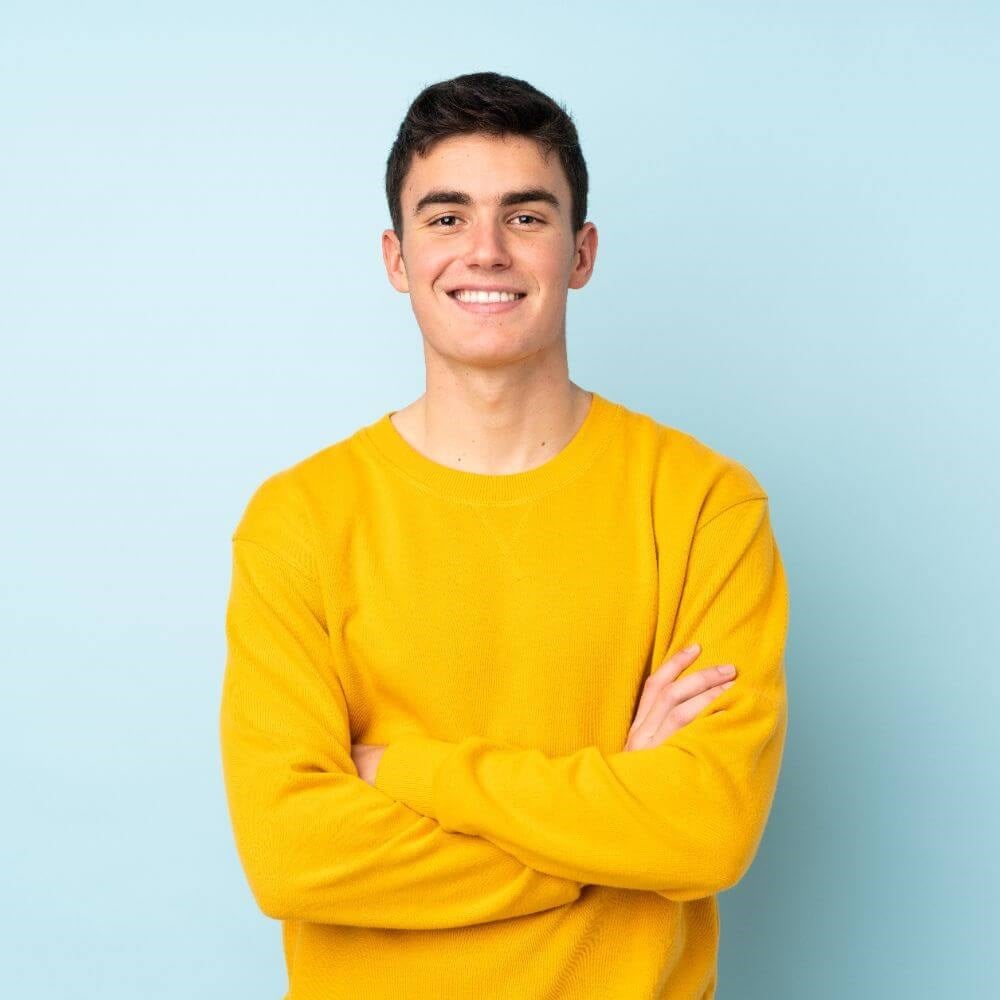 Man in Yellow Smiling